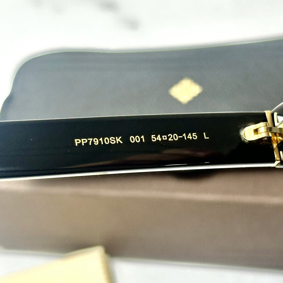 Patek Philippe Sunglasses with Saffiano Leather Case