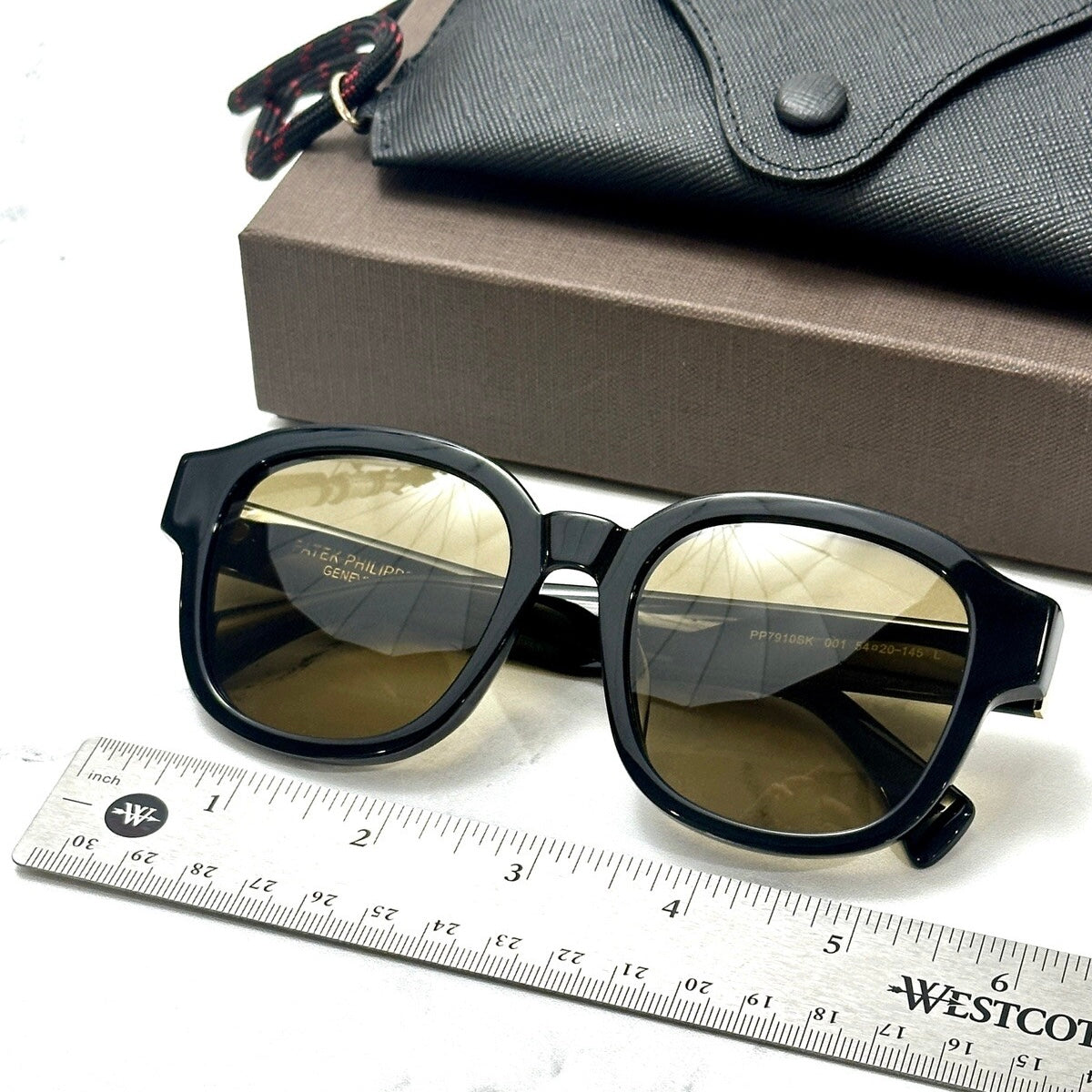 Patek Philippe Sunglasses with Saffiano Leather Case